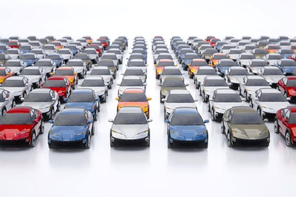 Multi-colored cars parked in a rows